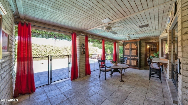 426 E Carol Ann Way, Phoenix, AZ 85022 - sunroom featuring stone tile flooring and wooden ceiling