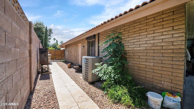 426 E Carol Ann Way, Phoenix, AZ 85022 - view of side of home with brick siding, a tile roof, and a fenced backyard