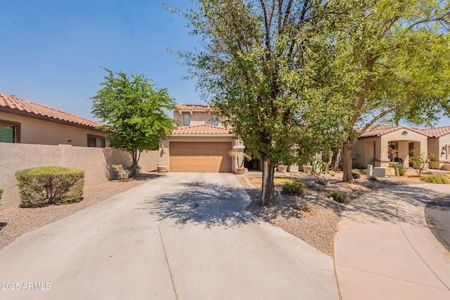 7169 S Dodane Ct, Gilbert, AZ 85298 - mediterranean / spanish house with driveway, a tiled roof, stucco siding, fence, and a garage