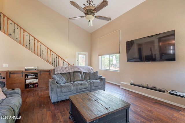 7169 S Dodane Ct, Gilbert, AZ 85298 - living room with ceiling fan, hardwood / wood-style flooring, high vaulted ceiling, and baseboards