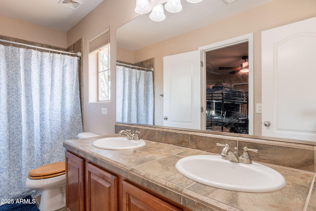 7169 S Dodane Ct, Gilbert, AZ 85298 - full bath featuring toilet, double vanity, and a shower with shower curtain
