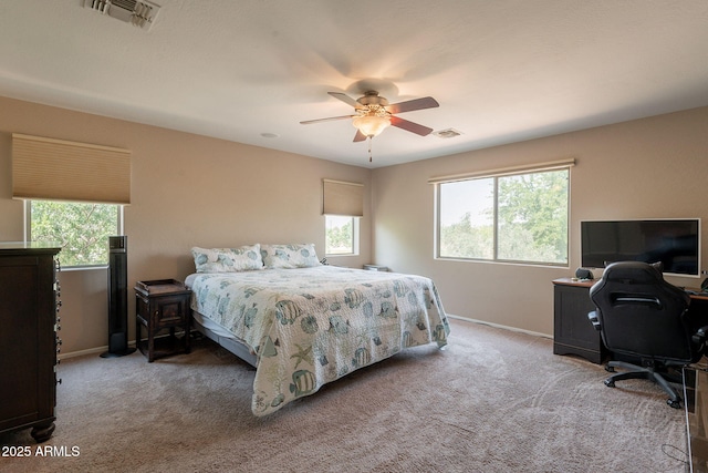 7169 S Dodane Ct, Gilbert, AZ 85298 - carpeted bedroom with multiple windows, baseboards, a desk, and a ceiling fan