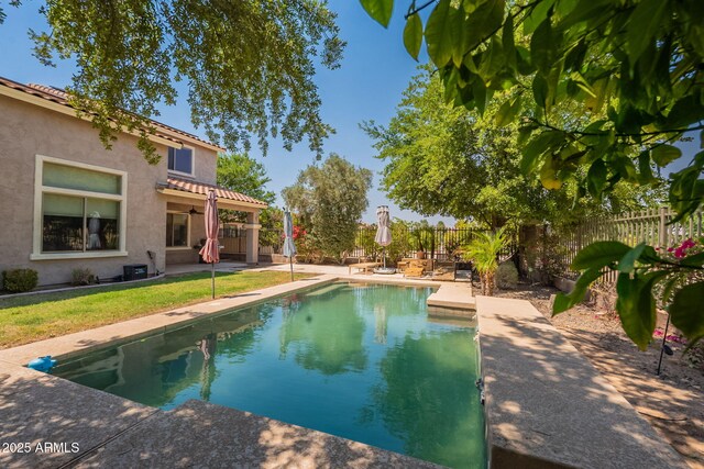 7169 S Dodane Ct, Gilbert, AZ 85298 - view of swimming pool with a patio area, a fenced backyard, and a ceiling fan