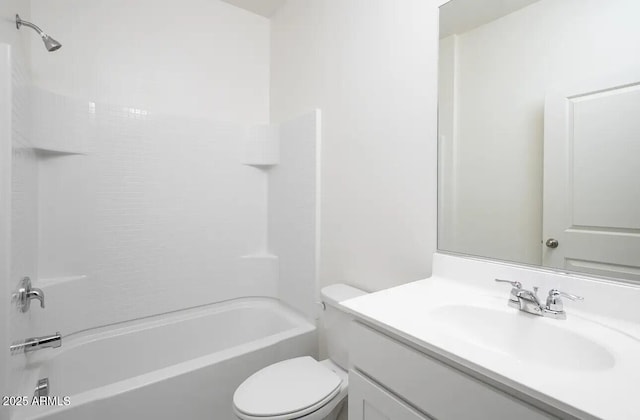 bathroom with shower / bathtub combination, vanity, and toilet