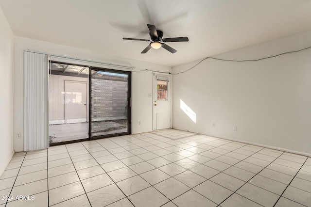 unfurnished room featuring ceiling fan and light tile patterned flooring