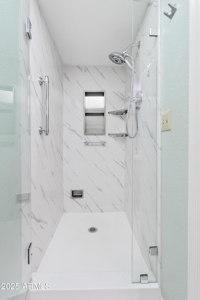 bathroom featuring walk in shower