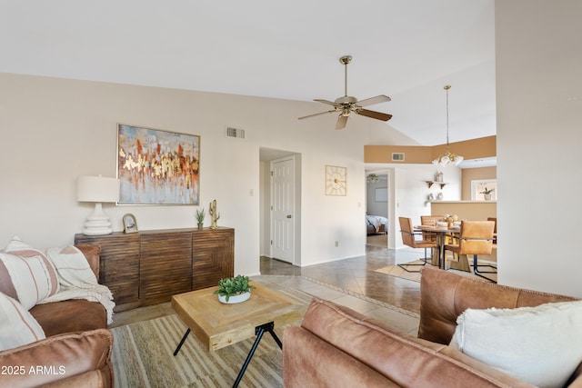 tiled living room with lofted ceiling and ceiling fan