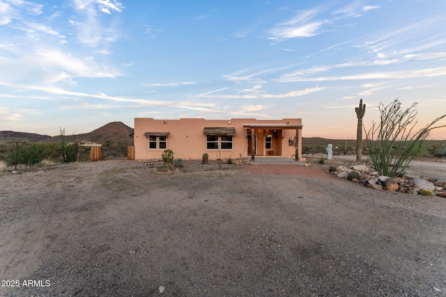 3874 Pura Vida Trl, Wickenburg, AZ 85390 - southwest-style home with stucco siding and a mountain view