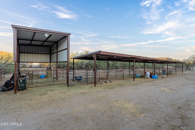 3874 Pura Vida Trl, Wickenburg, AZ 85390 - view of outbuilding featuring an exterior structure, an outbuilding, and a rural view