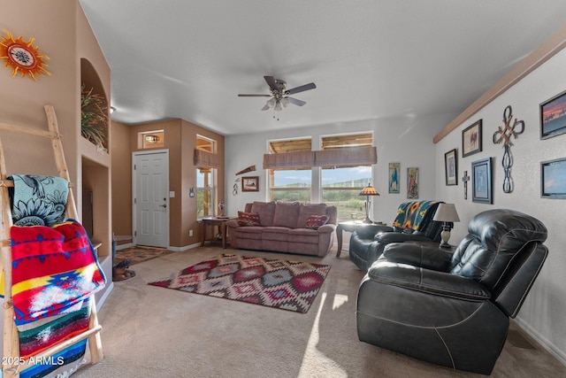 3874 Pura Vida Trl, Wickenburg, AZ 85390 - living area with baseboards, carpet, and a ceiling fan