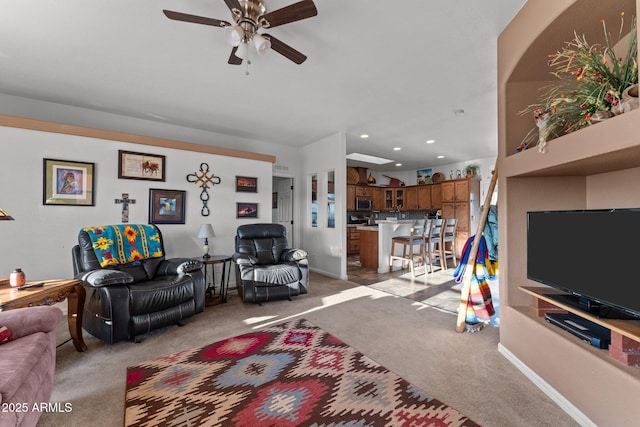 3874 Pura Vida Trl, Wickenburg, AZ 85390 - living area featuring visible vents, baseboards, ceiling fan, recessed lighting, and light carpet