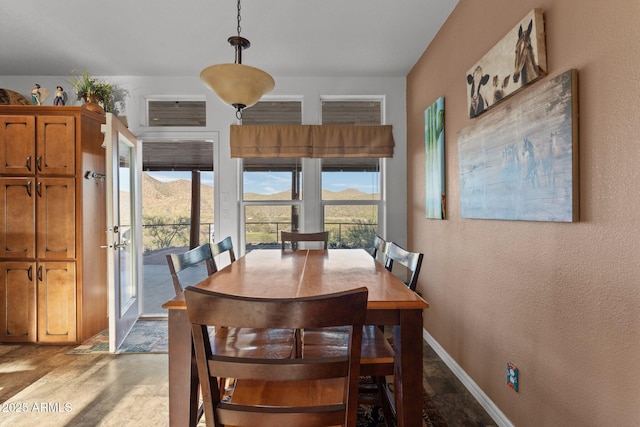 3874 Pura Vida Trl, Wickenburg, AZ 85390 - dining area with a textured wall and baseboards