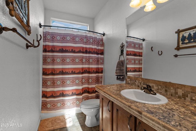 3874 Pura Vida Trl, Wickenburg, AZ 85390 - full bathroom featuring toilet, decorative backsplash, vanity, and shower / bath combo with shower curtain