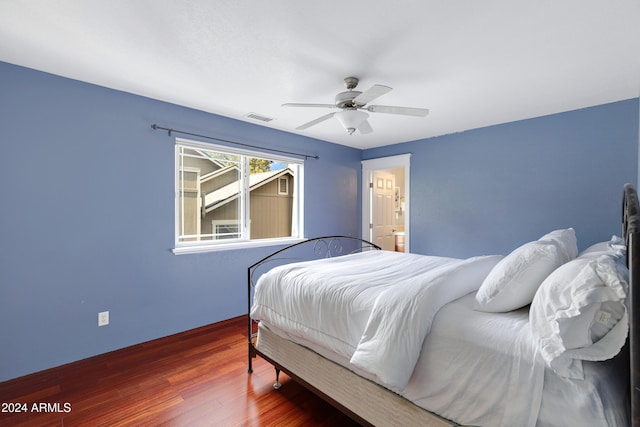 bedroom featuring wood-type flooring and ceiling fan