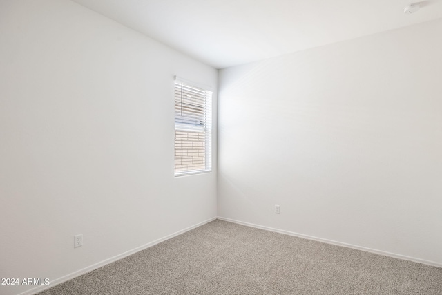 empty room with carpet floors