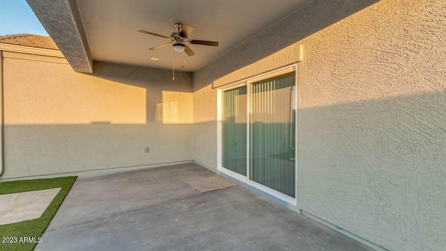 view of patio / terrace featuring ceiling fan