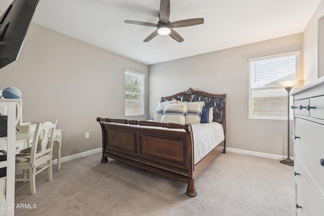 1281 W Highland Rd, San Tan Valley, AZ 85143 - bedroom with baseboards, light carpet, and a ceiling fan