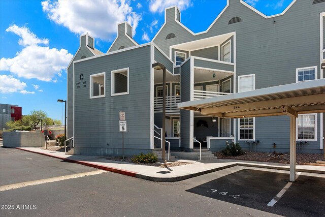 1505 N Center St Unit 218, Mesa, AZ 85201 - view of building exterior with covered parking