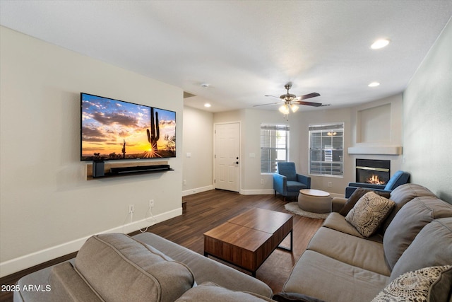 1505 N Center St Unit 218, Mesa, AZ 85201 - living area featuring dark wood-style floors, baseboards, a glass covered fireplace, ceiling fan, and recessed lighting