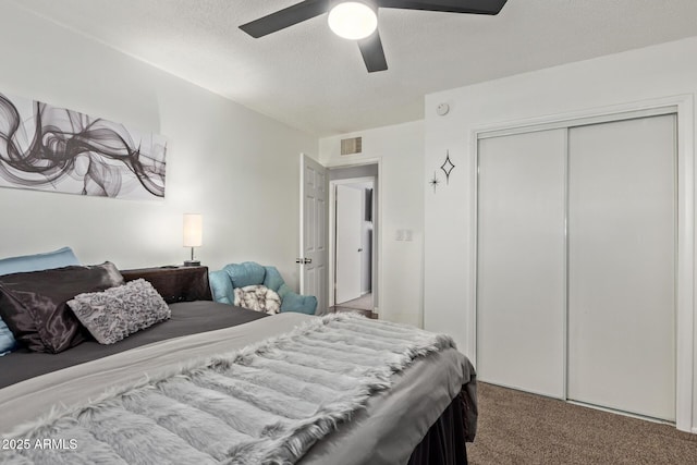 13614 N 33rd Ave, Phoenix, AZ 85029 - bedroom with carpet flooring, a closet, a ceiling fan, and a textured ceiling