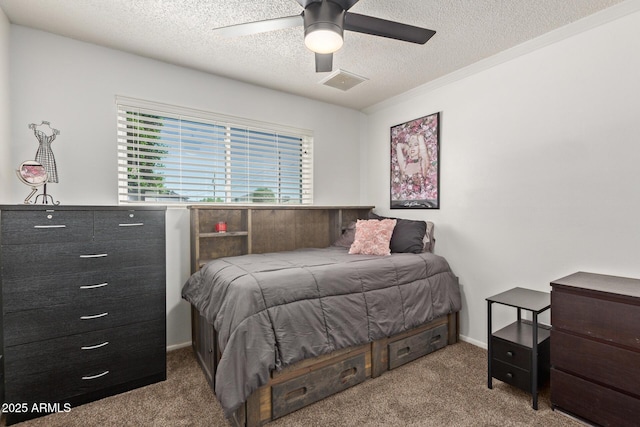 13614 N 33rd Ave, Phoenix, AZ 85029 - carpeted bedroom featuring a textured ceiling and a ceiling fan