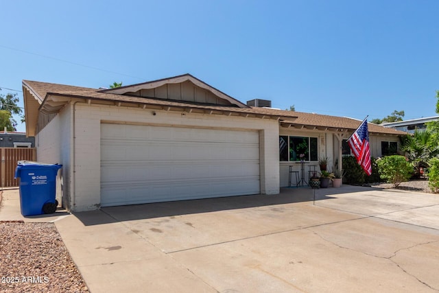 13614 N 33rd Ave, Phoenix, AZ 85029 - single story home with brick siding, driveway, an attached garage, and a shingled roof