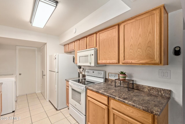 13614 N 33rd Ave, Phoenix, AZ 85029 - kitchen featuring white appliances, washer / dryer, and light tile patterned floors
