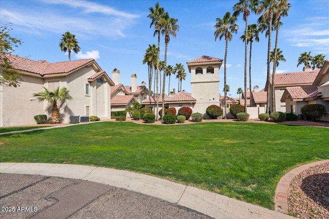 exterior space featuring a lawn