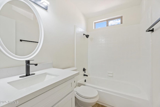 full bathroom with shower / washtub combination, vanity, and toilet