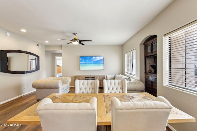 living area featuring recessed lighting, visible vents, dark wood-type flooring, ceiling fan, and baseboards