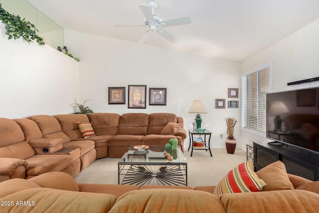 carpeted living room featuring ceiling fan