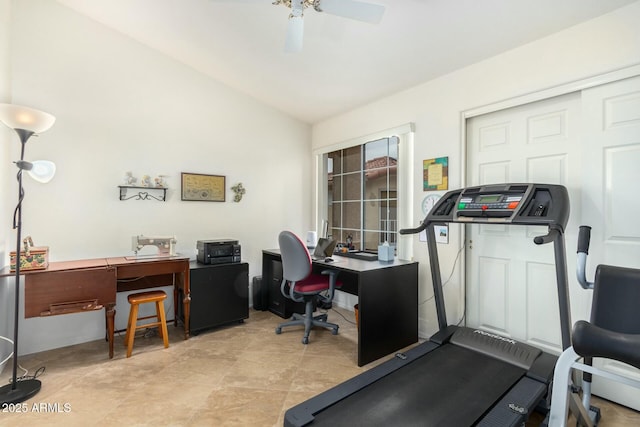 workout area with ceiling fan and vaulted ceiling