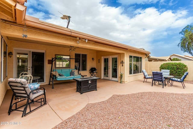 exterior space with outdoor lounge area and french doors