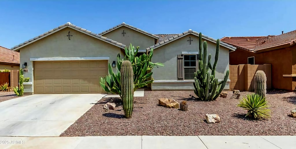 ranch-style home with a garage