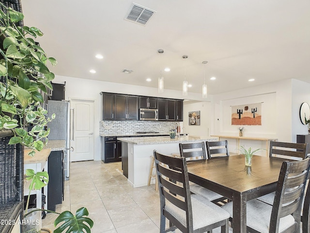 view of tiled dining space