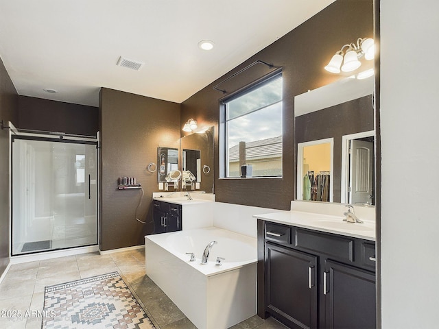 bathroom with vanity, tile patterned flooring, and independent shower and bath