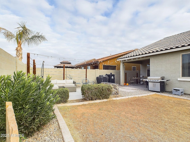 view of yard with a patio and outdoor lounge area