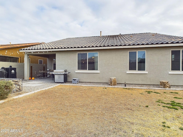 back of house featuring a patio area