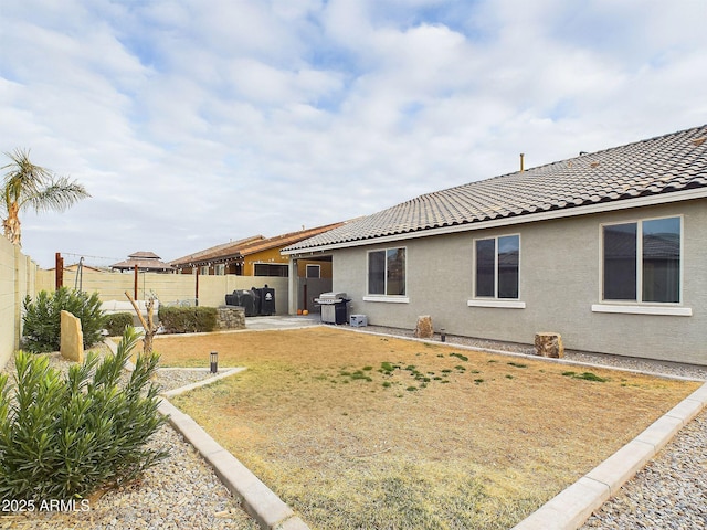 back of house featuring a patio