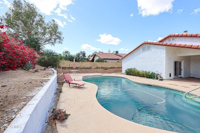 view of pool featuring a fenced in pool, a patio area, and fence