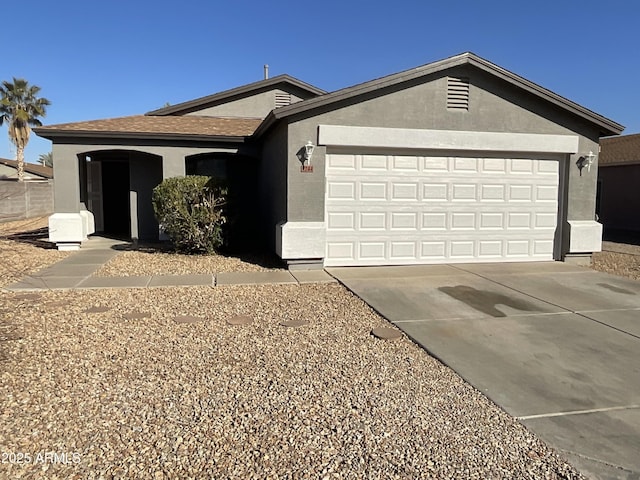 ranch-style home with a garage