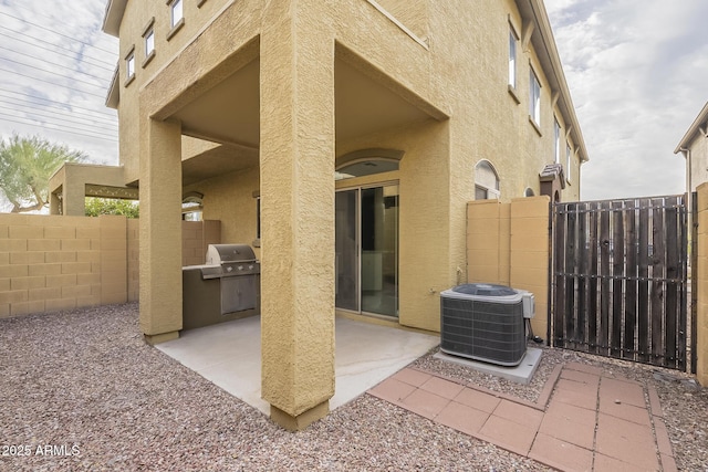 view of patio featuring central AC and grilling area