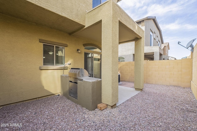 view of patio with area for grilling