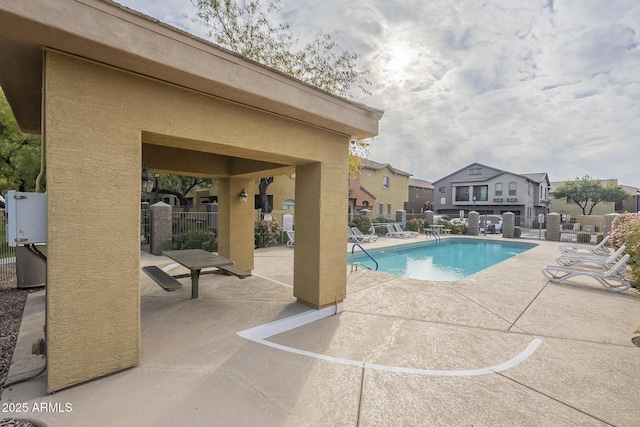 view of pool with a patio