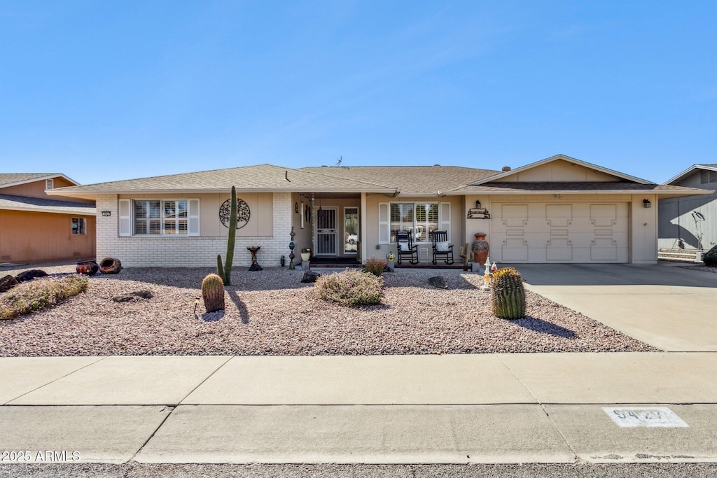 ranch-style home with a garage