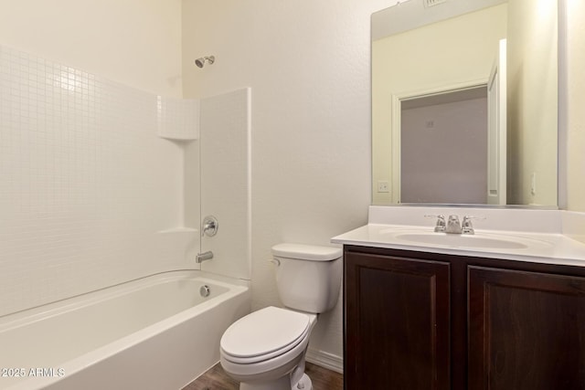 full bathroom with shower / tub combination, vanity, and toilet