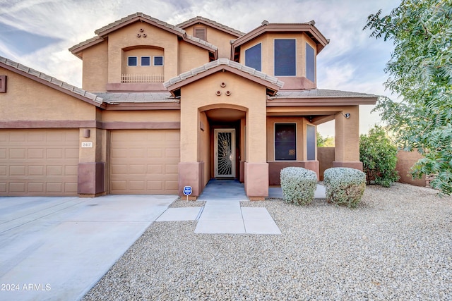 view of front of property featuring a garage