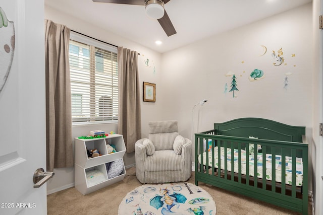 2631 S Sulley Dr Unit 106, Gilbert, AZ 85295 - carpeted bedroom featuring a crib and a ceiling fan