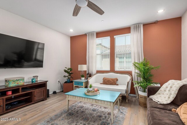 2631 S Sulley Dr Unit 106, Gilbert, AZ 85295 - living room featuring a ceiling fan, light wood-style flooring, recessed lighting, and baseboards