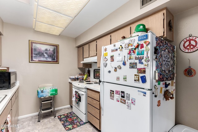 kitchen featuring white appliances